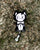 Lucy the Skeleclock Enamel Pin